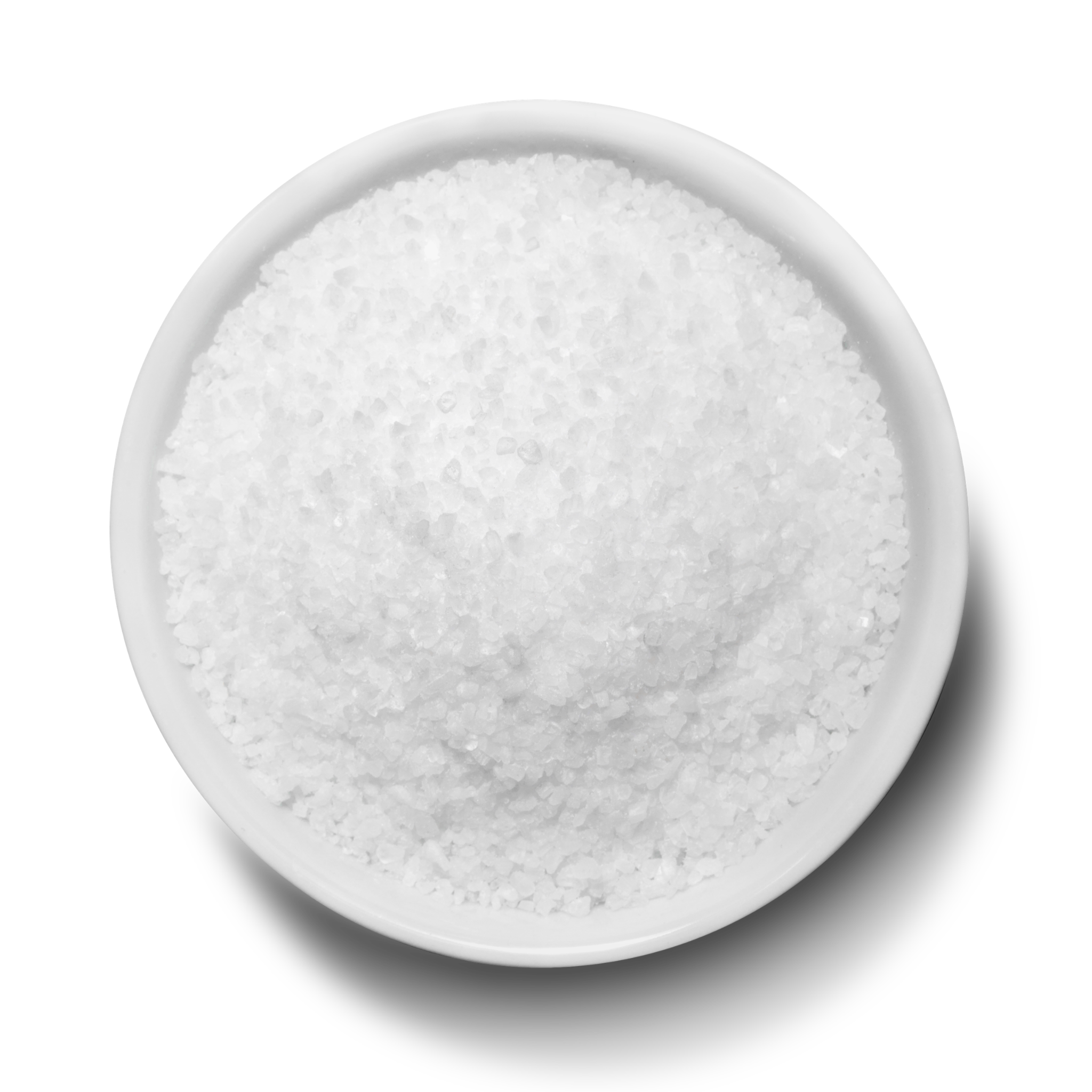 White salt in a round bowl on a white background